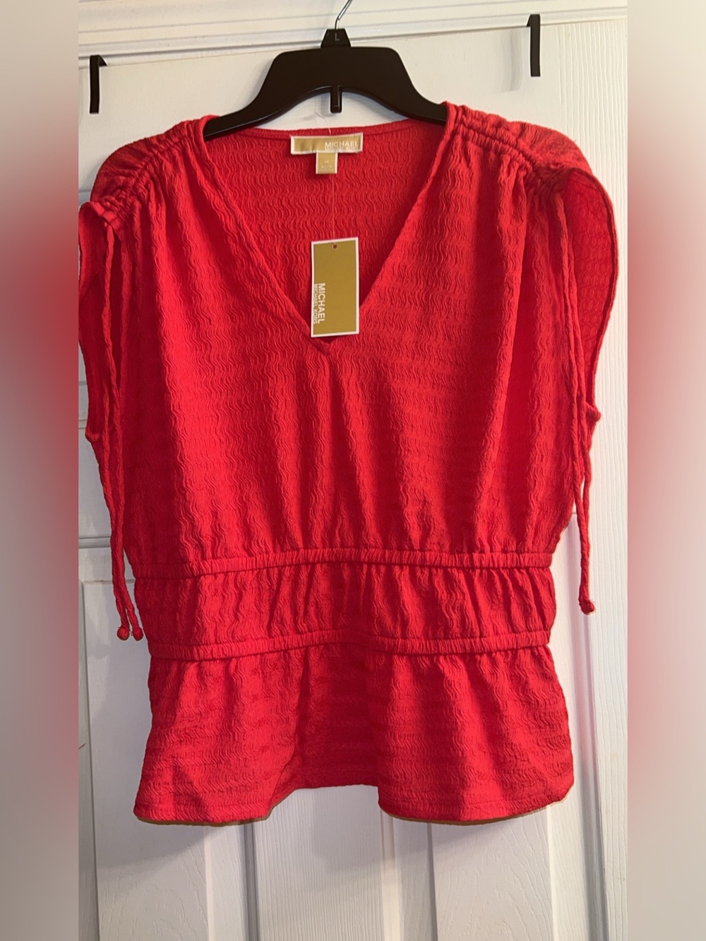 Michael Kors Coral Textured V-Neck Peplum Top